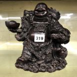 CHINESE CARVING OF A LAUGHING BUDDHA 23CM
