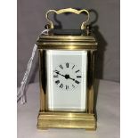 A MINIATURE GILT METAL CARRIAGE CLOCK ACG 278 8CMHIGH