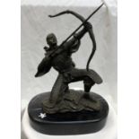 A 20TH CENTURY PATINATED FIGURE OF A KNEELING ARCHER ON OVAL MARBLE BASE