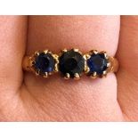 LADIES YELLOW METAL THREE SAPPHIRE RING SIZE P 3.