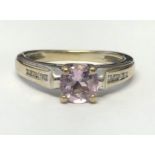 9CT WHITE GOLD AMETHYST AND DIAMOND RING 2.