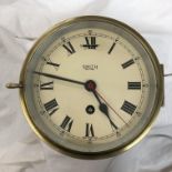 A SMITH ASTRAL BRASS CASED SHIPS PORTHOLE CLOCK 17CM DIAL