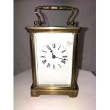 A BRASS CARRIAGE CLOCK A/F 14CM HIGH