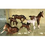 BESWICK BROWN FOALS AND RECUMBENT FOALS 915 WITH OUTSTRETCHED LEGS AND A ROYAL BELVEDERE DAPPLE