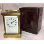 A BRASS CARRIAGE CLOCK IN CARRY CASE A/F 13 CM HIGH