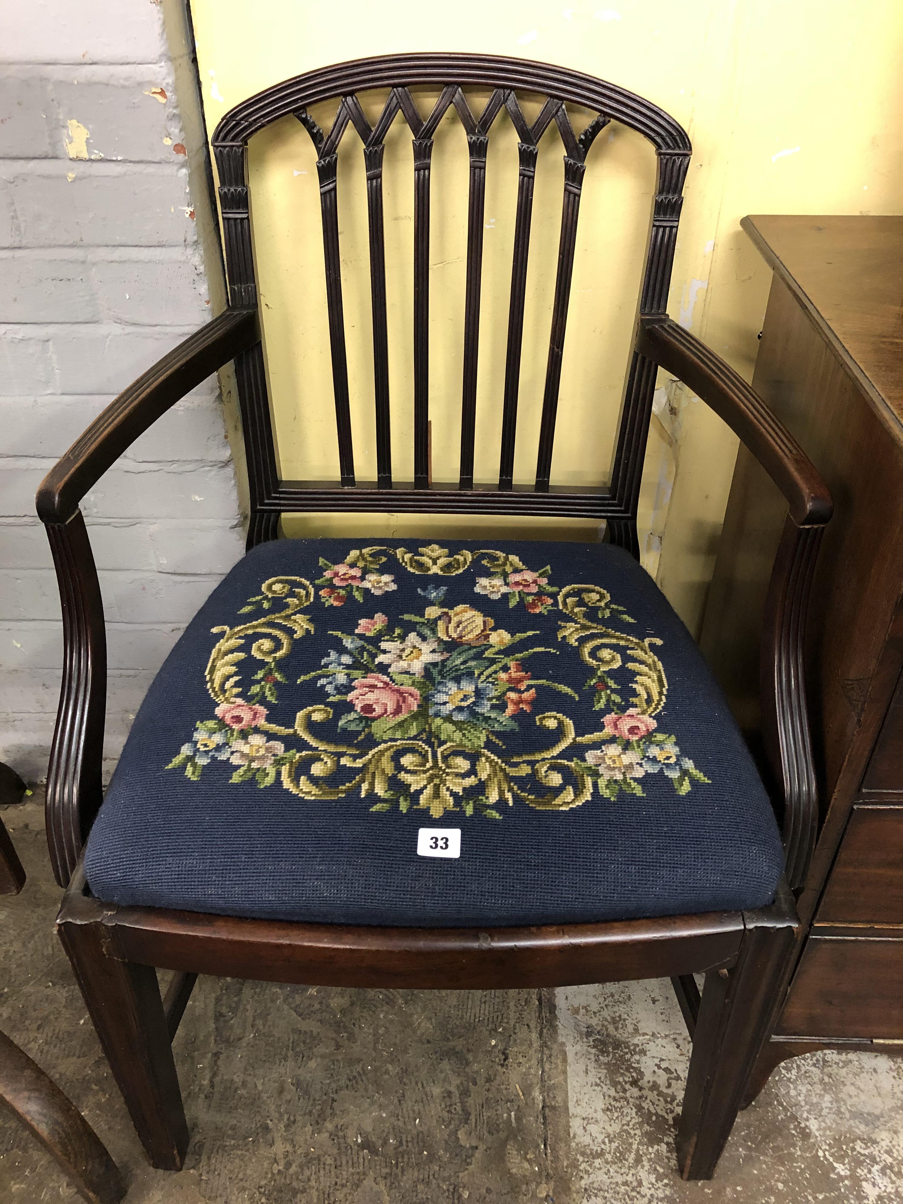 GEORGE III MAHOGANY REEDED ARCHED BACK ELBOW CHAIR