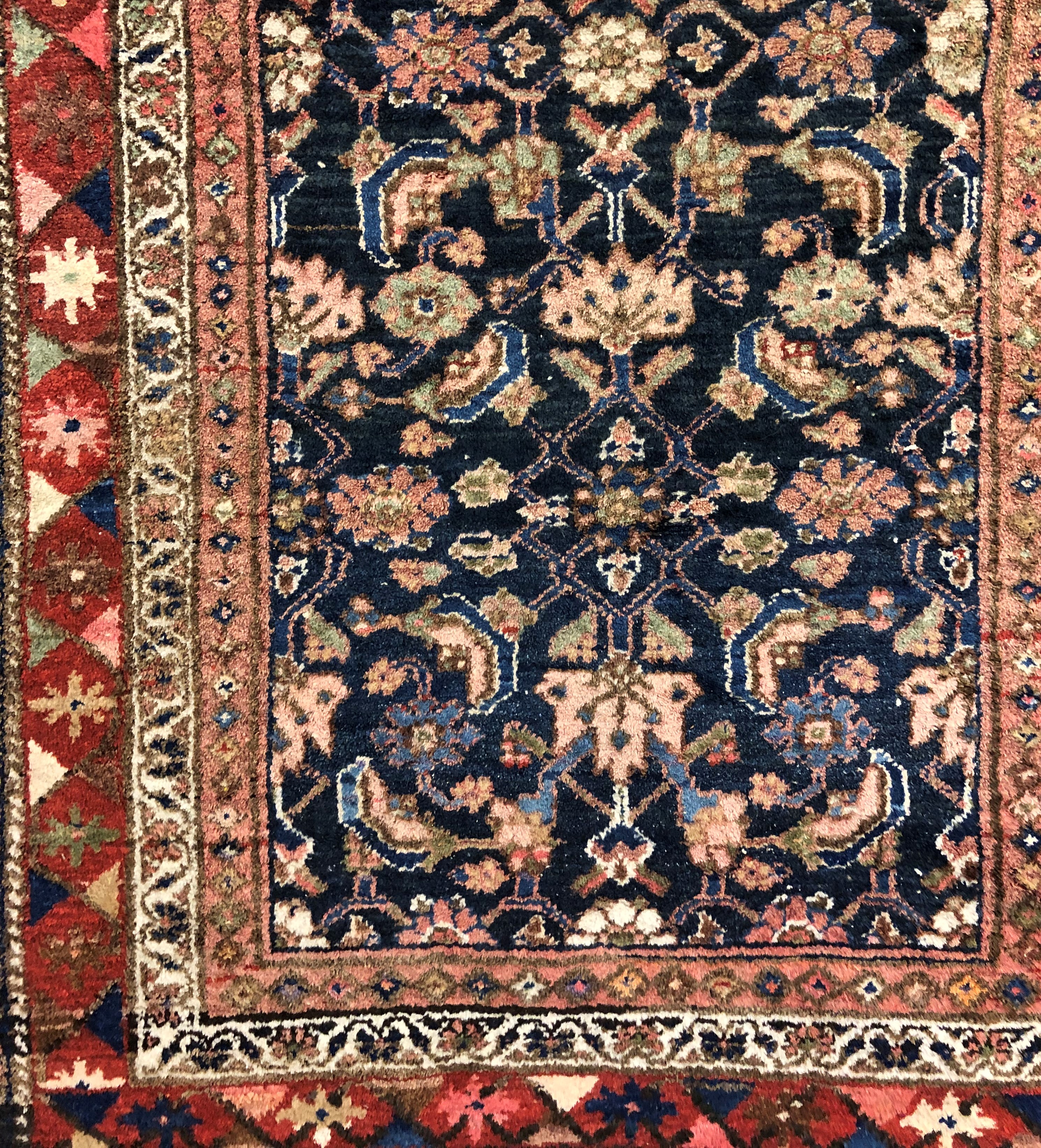 20 TH CENTURY CAUCASIAN CARPET WITH CENTRAL FLORAL MOTIFS ON A BLUE GROUND WITHIN GEOMETRIC PATTERN - Image 5 of 5