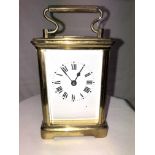 A FRENCH BRASS 5 PANE CARRIAGE CLOCK NUMBERED 7036-15CM HIGH