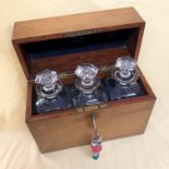 19TH CENTURY MAHOGANY DECANTER BOX FITTED WITH THREE SQUARE SECTION BOTTLES WITH HEXAGONAL