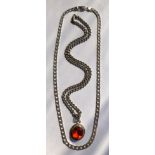 SILVER FLAT CURB LINK NECK CHAIN AND 925 SILVER ORANGE FACET CUT GLASS PENDANT ON CHAIN.