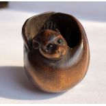 JAPANESE WOOD NETSUKE OF A CURLED BAT