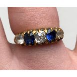 9CT GOLD SINGLE DIAMOND RING WITH TWO CZ STONES AND TWO SAPPHIRE STONES SIZE L 3.