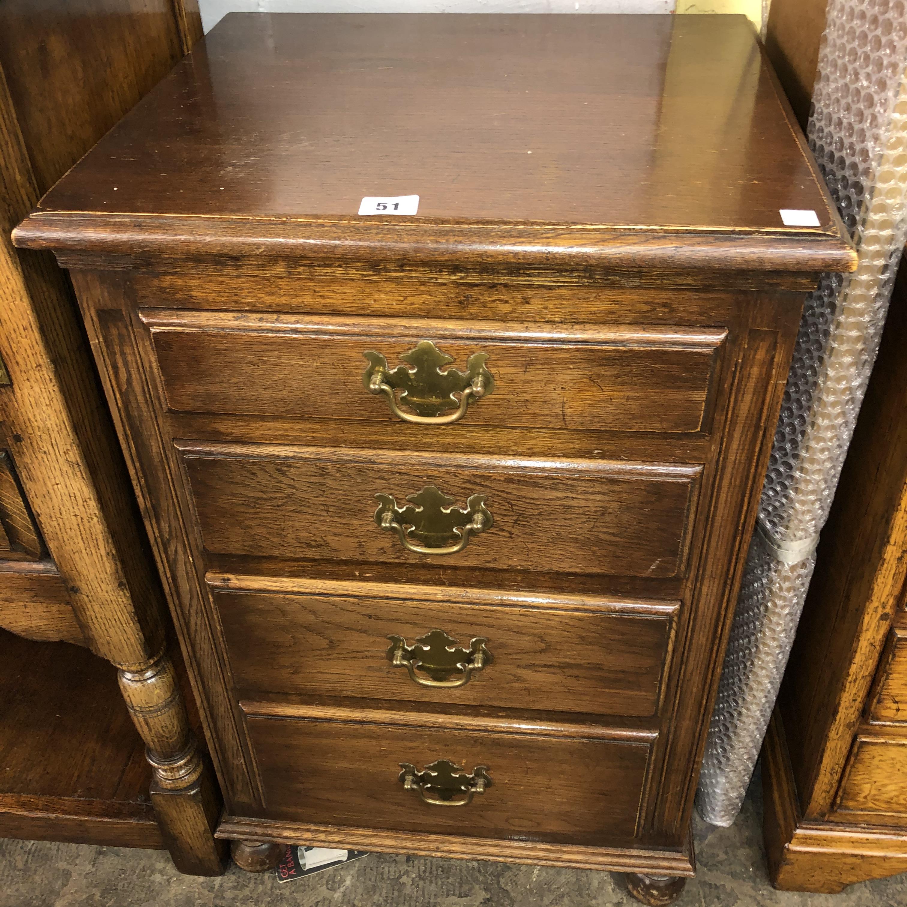 OAK FOUR DRAWER CHEST ON BUN FEET