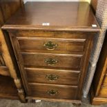 OAK FOUR DRAWER CHEST ON BUN FEET