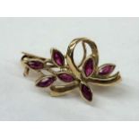 9CT GOLD AND RUBY PETAL BROOCH 2.