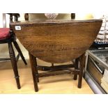 SMALL OVAL OAK DROP FLAP TABLE