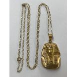 9CT GOLD FINE BELCHER LINK CHAIN WITH A STAMPED YELLOW METAL TUTANKAHMEN PENDANT 5.