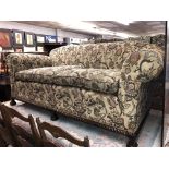 GOOD QUALITY EDWARDIAN GADROONED SHOW FRAME DROP ARM SOFA UPHOLSTERED IN FLORAL FABRIC