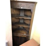 CARVED OAK OPEN CORNER CUPBOARD WITH SERPENTINE SHELVES