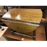 REPRODUCTION OAK OVAL DROP FLAP LOW TABLE