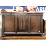 OAK LINENFOLD BLANKET BOX ON BUN FEET