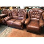 GEMALINEA BROWN LEATHER TWO SEATER SOFA AND A PAIR OF ARMCHAIRS