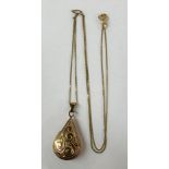 9CT GOLD TEARDROP ENGRAVED LOCKET ON TRACE CHAIN 1.