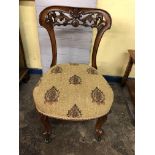 VICTORIAN CARVED WALNUT UPHOLSTERED CHAIR ON CABRIOLE LEGS