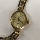 LADIES EVERITE WRIST WATCH ON 9CT GOLD STRAP 8.