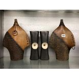 PAIR OF CONTEMPORARY WOODEN AND FAUX CROCODILE SKIN VASES AND A PAIR OF PIERCED CYLINDRICAL VASES