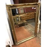 GILT SWEPT FRAMED MIRROR