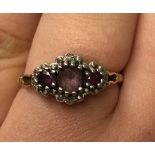 9CT GOLD THREE STONE AMETHYST RING 2.