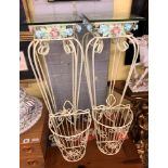 PAIR OF CREAM PAINTED METALWORK AND FLORAL ENCRUSTED GLASS TOP STANDS AND WIREWORK BASKETS