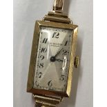 LADIES JW BENSON WRIST WATCH ON A 9CT GOLD EXPANDING BRACELET STRAP 16G APPROX OVERALL