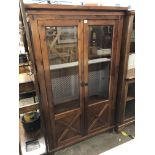 MORRIS & CO DARK WOOD TWO DOOR ILLUMINATED VITRINE