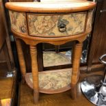 TAPESTRY TOPPED DEMI LUNE SIDE TABLE WITH CENTRAL DRAWER