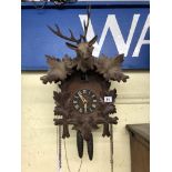 CUCKOO CLOCK WITH TWO WEIGHTS AND PENDULUM