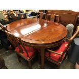 CHINESE DESIGN OVAL EXTENDING DINING TABLE AND FIVE CHAIRS