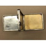 SILVER DOUBLE SIDED CIGARETTE CASE WITH ENGINE TURNED DECORATION 4.