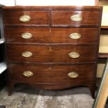 GEORGE III MAHOGANY CROSS BANDED BOW FRONTED TWO OVER THREE DRAWER ON SLAY BRACKET FEET