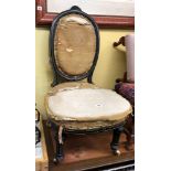 LATE 19TH CENTURY EBONISED AND PARCEL GILDED CAMEO BACKED NURSING CHAIR A/F