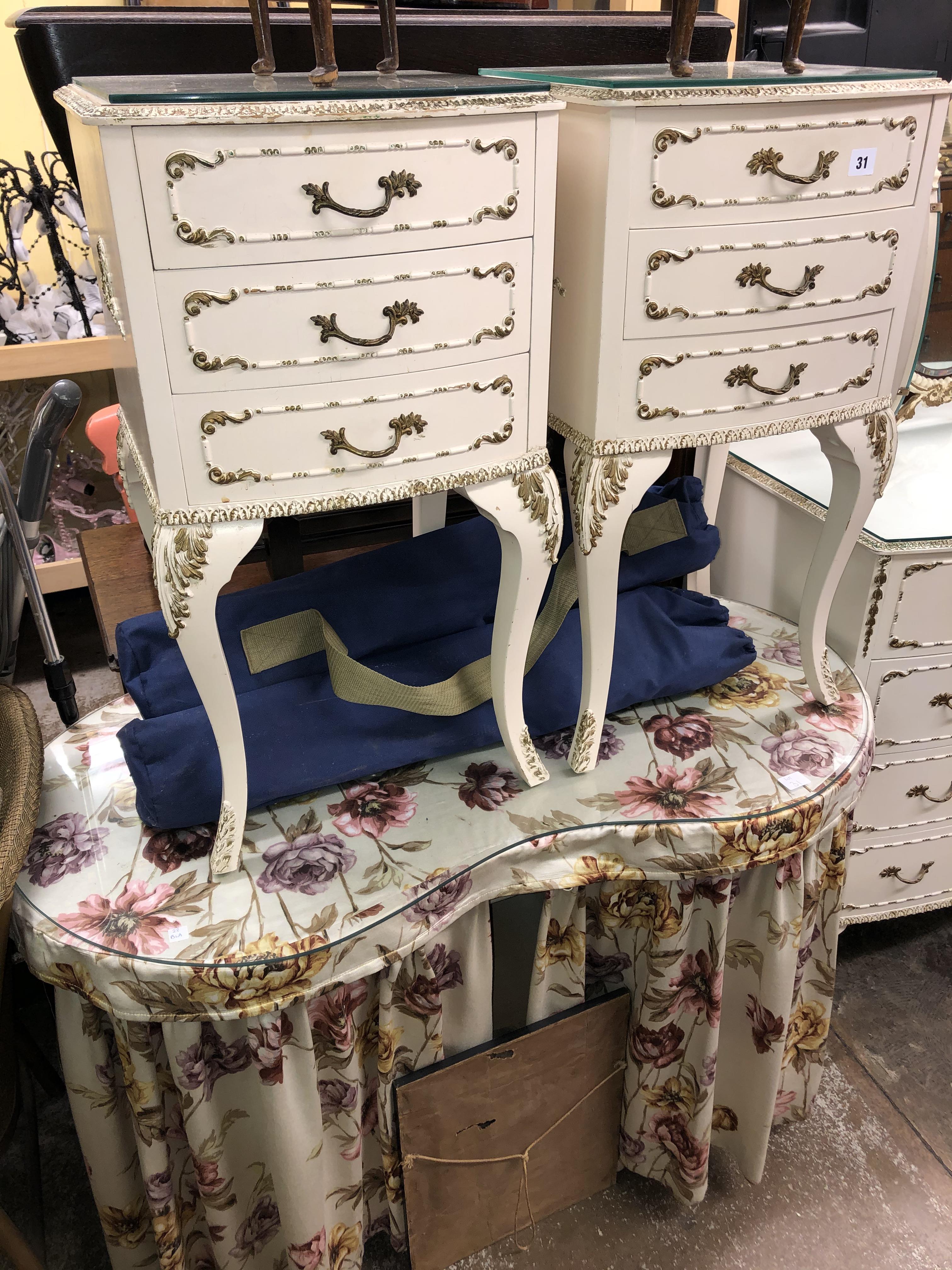 KIDNEY SHAPED DRESSING TABLE AND A PAIR OF CREAM PAINTED THREE DRAWER CHESTS