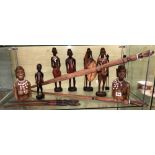 SHELF OF AFRICAN CARVED MASAI FIGURES