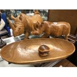 TWO CARVED WOODEN RHINOCEROS,