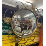 CONVEX MIRROR IN GILT FLORAL FRAME