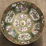 19TH CENTURY CANTONESE FAMILLE ROSE PUNCH BOWL DECORATED WITH PANELS OF FIGURES AND BIRDS AMIDST