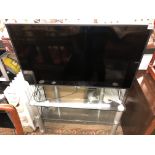 SAMSUNG FLAT SCREEN TV AND MEDIA STAND