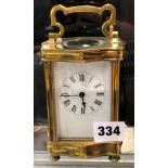 SERPENTINE CASED CARRIAGE CLOCK WITH KEY