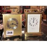 GARRARD AND CO OF LONDON BRASS CARRIAGE CLOCK AND A QUARTZ CARRIAGE CLOCK