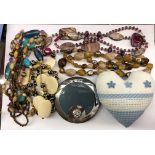 SMALL BOX OF COSTUME BEADS AND DECORATIVE COMPACT